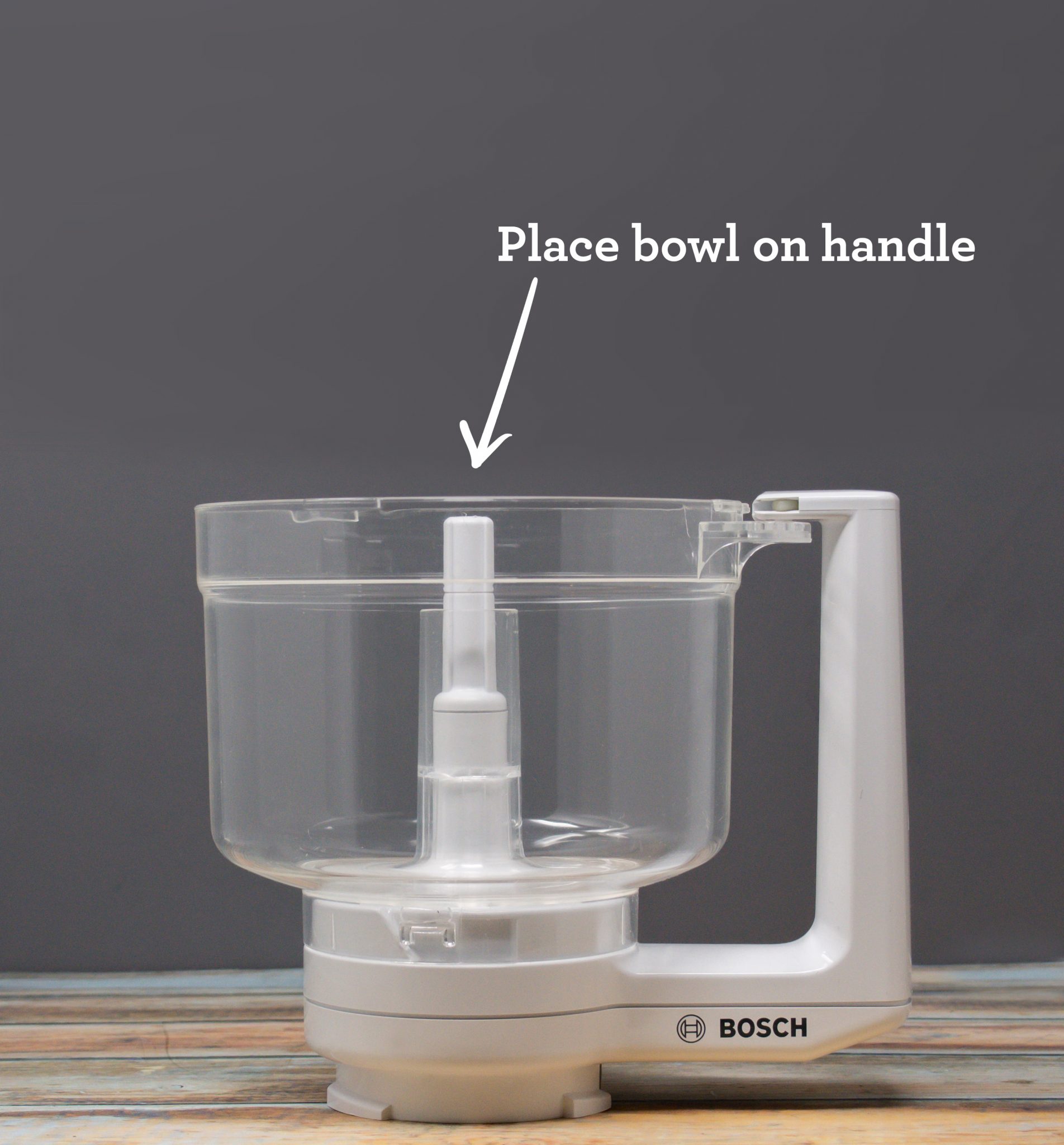 The Bosch Universal Food Processor Bosch Mixers USA   FoodProcessoranimated 0005 Place Bowl On Handle 1904x2048 